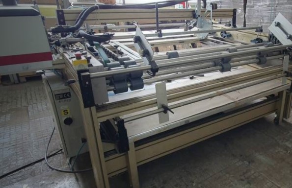 Folding, gluing and taping machine